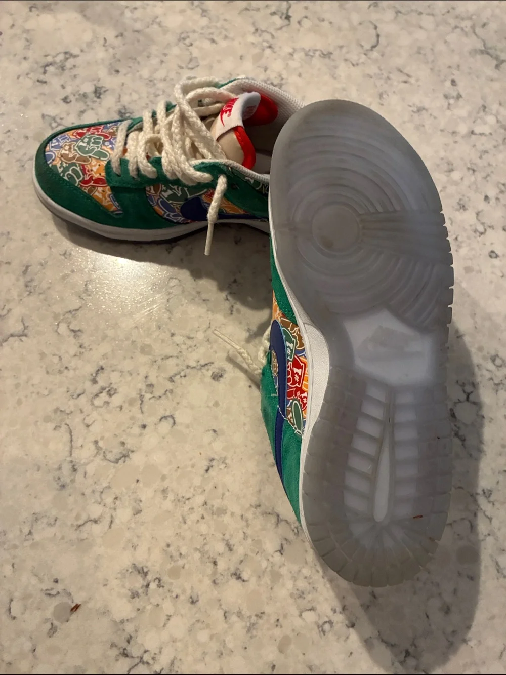 Nike Kids Green Suede Sneakers with Multicolor Graphic